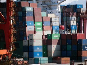 Containers sit stacked at the DP World and Global Container Terminals Inc. in Vancouver last week. A shipping container shortage that's left everything from Thai curry to Canadian peas idling in ports may be about to get a whole lot worse as China steps up its coronavirus precautions on incoming vessels.