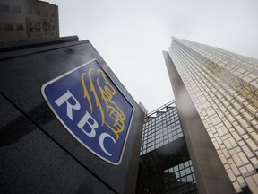 Signage is displayed outside of the Royal Bank of Canada (RBC) headquarters building during the company's annual general meeting in Toronto, Ontario, Canada, on Thursday, April 6, 2017.
