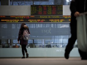 A Toronto Stock Exchange (TSX) ticker is seen in the financial district of Toronto, Ontario, Canada, on Monday, March 16, 2020.