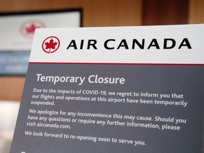 A "Temporary Closure" sign is displayed on an Air Canada ticketing counter in Terminal 2 at San Diego International Airport (SAN) in San Diego, California.