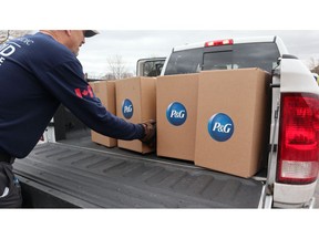 GlobalMedic volunteer delivers P&G hygiene products to a local foodbank.