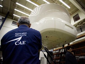 CAE had announced last month that it had temporarily closed three commercial aviation training centers, was laying off 465 workers and slashing executive salaries and capital expenditures to contain costs.