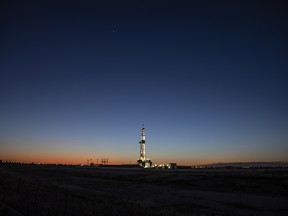 An active oil drilling rig stands in Midland, Texas, U.S, on Thursday, April 23, 2020.