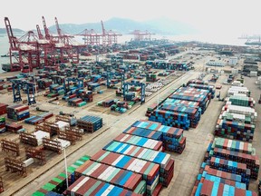 Containers stacked at a port in Lianyungang in China's eastern Jiangsu province on April 14. Market sentiment was boosted by data showing China's exports fell only 6.6 per cent in March from a year ago, less than the expected 14 per cent plunge. Imports fell 0.9 per cent compared with expectations for a 9.5 per cent drop.