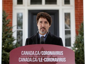 Prime Minister Justin Trudeau speaks during a news conference outside Rideau Cottage in Ottawa.