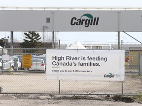 A sign is shown outside the Cargill facility in High River, Alta., on May 6.