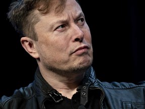 Elon Musk,chief executive of Tesla Inc., listens during a discussion at the Satellite 2020 Conference in Washington in March. Musk lashed out over the weekend at the California county blocking Tesla from reopening its only U.S. car plant.