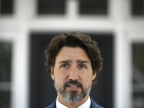 Prime Minister Justin Trudeau speaks during his daily news conference on the COVID-19 pandemic outside his residence at Rideau Cottage in Ottawa, on Tuesday, May 19, 2020.