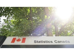 Statistics Canada building and signs are pictured in Ottawa on Wednesday, July 3, 2019. Statistics Canada is expected to report today that economic growth swung negative in March and the first quarter as a whole due to the COVID-19 pandemic.