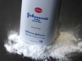 A container of Johnson's baby powder made by Johnson and Johnson.