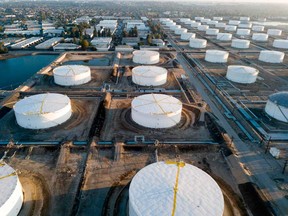 Oil-storage tanks in Carson, California. There are signs that production cuts are reducing the glut of crude oil.