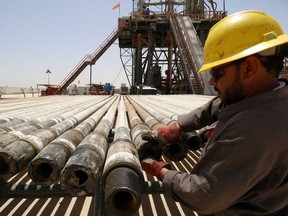 A man working at Rumaila oilfield in Basra, Iraq.