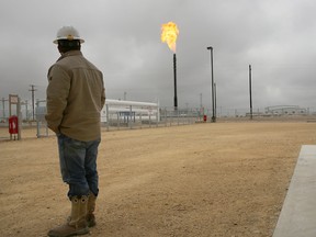 Flared natural gas is burned off at Apache Corporations operations at the Deadwood natural gas plant in the Permian Basin in Garden City, Texas.