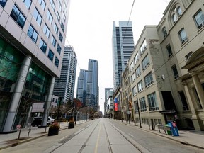 A near deserted King Street West is seen during the coronavirus pandemic in Toronto, Canada. The city is concerned about a potential flare-up in the pandemic if too many people flood the downtown core as restrictions are lifted.