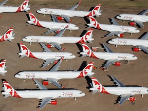 Decommissioned and suspended Air Canada commercial aircrafts are seen stored in Pinal Airpark on May 16, 2020 in Marana, Arizona.