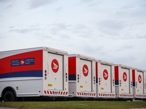 Canada Post Corp. mail delivery trucks in Toronto.