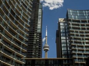 Condos frame the CN Tower in Toronto.