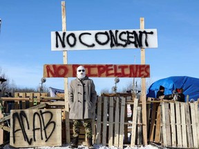 Supporters of the indigenous Wet'suwet'en Nation's hereditary chiefs camp at a railway blockade as part of protests against British Columbia's Coastal GasLink pipeline, in Edmonton, Alberta, in February.