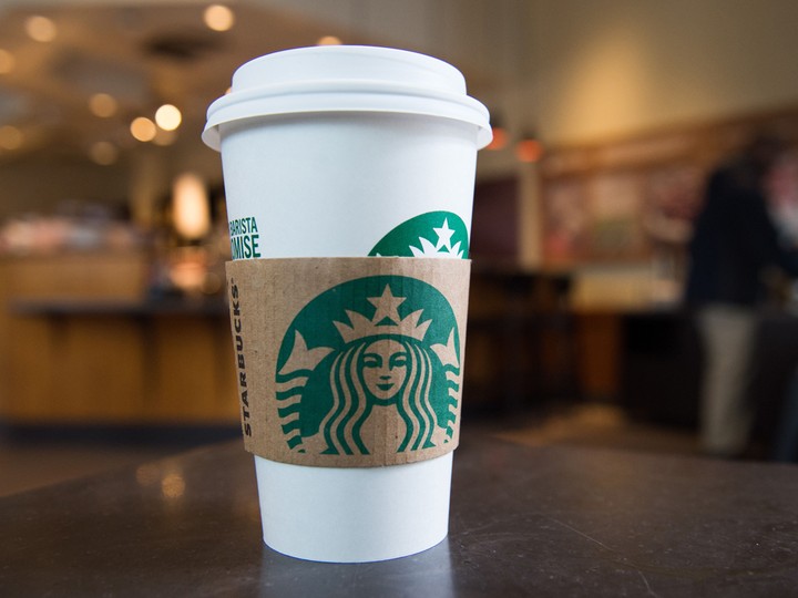  A coffee cup inside a Starbucks, a Tim Hortons competitor.