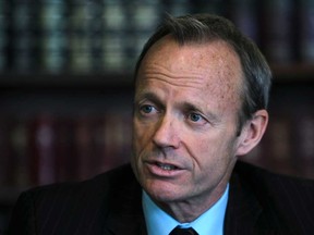 Stockwell Day has resigned from Telus' board of directors and as a strategic adviser to a law firm after comparing racism to his experience of being mocked in school for wearing glasses.