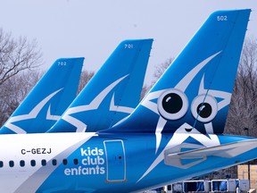 Air Transat aircraft are seen on the tarmac at Montreal-Trudeau International Airport in Montreal, on Wednesday, April 8, 2020.