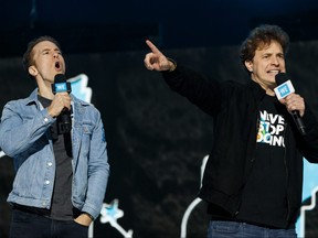 WE co-founders Craig, left, and Marc Kielburger speak during a WE Day event last year.