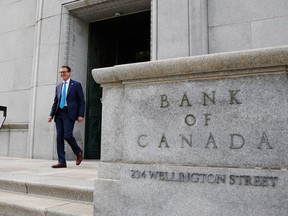 Governor Tiff Macklem exits the Bank of Canada building in June.
