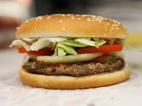 Burger King is debuting a Whopper sandwich Tuesday made from cattle raised on a diet supplemented with lemongrass.