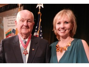Albinas Markevicius and his daughter, Zina Markevicius, during a 2013 ceremony receiving the Medal of Diplomacy from the Lithuanian Embassy in Washington, D.C.