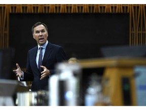 Minister of Finance Bill Morneau rises during a meeting of the Special Committee on the COVID-19 Pandemic in the House of Commons on Parliament Hill in Ottawa, on Wednesday, June 17, 2020. The federal Liberals will lay out today how they see the COVID-19 affecting federal finances for the fiscal year, detailing an estimated deficit and a projected path for the economy.
