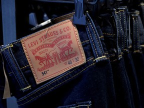 The Levi's label is seen on hanging pants at a Levi Strauss store in New York, United States, March 19, 2019.