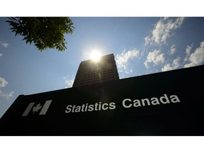 Statistics Canada building and signs are pictured in Ottawa on Wednesday, July 3, 2019. Statistics Canada will say this morning how the economy fared in May and provide its preliminary estimate for June to give a picture of the first half of a year marked by the COVID-19 pandemic.