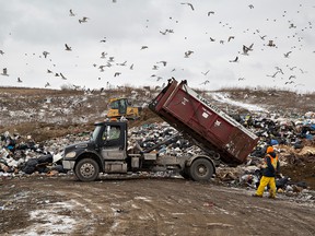 A truck unloads garbage at a landfill in Brantford, Ont.