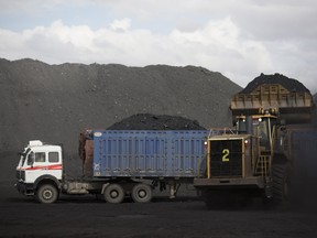 Coal is loaded onto a truck at the Tavan Tolgoi coal deposit, developed by Erdenes Tavan Tolgoi LLC (Erdenes TT), in Tsogttsetsii, Omnogovi province, Mongolia.