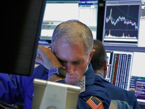 A trader on the floor of the New York Stock Exchange, Monday, March 9, 2020.