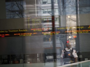 A Toronto Stock Exchange ticker is seen in Toronto’s financial district in March.