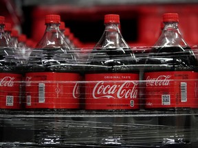 Bottles of Coca-Cola Co. brand soda sit ready for shipment at the Swire Coca-Cola bottling plant in West Valley City, Utah, U.S.