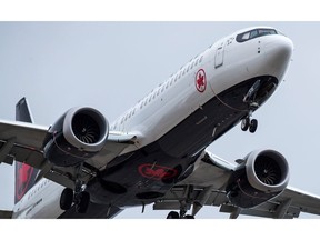 An Air Canada Boeing 737 Max 8 aircraft arriving from Toronto prepares to land at Vancouver International Airport, in Richmond, B.C., Tuesday, March 12, 2019. Transport Minister Marc Garneau says Boeing's Max 8 aircraft won't be allowed to fly in Canadian skies until officials believe all safety concerns have been addressed.