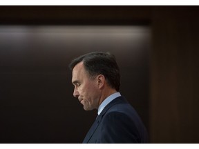 Minister of Finance Bill Morneau announces his resignation during a news conference on Parliament Hill in Ottawa, on Monday, Aug. 17, 2020.