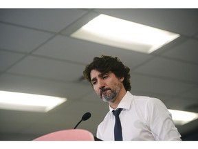 Prime Minister Justin Trudeau holds a press conference as he visits the Public Health Agency of Canada during the COVID-19 pandemic in Ottawa on Friday, July 31, 2020.