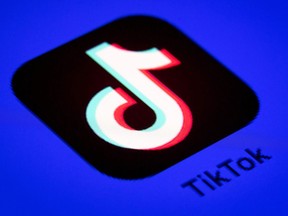 The logo of the social media video sharing app Tiktok displayed on a tablet screen.