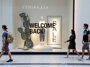 Stores in the Eaton Centre shopping mall welcome shoppers back, as the provincial phase 2 of reopening from the coronavirus disease (COVID-19) restrictions began in Toronto in late June.