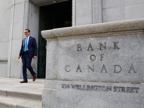 Tiff Macklem, governor of the Bank of Canada, walks out of the Bank of Canada building in Ottawa, on June 22, 2020.