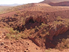 Juukan Gorge in Western Australia — one of the earliest known sites occupied by Aboriginals in Australia. Rio Tinto announced the resignation of its CEO and two top lieutenants Friday over the mining giant's destruction of a 46,000-year-old Aboriginal site to expand an iron ore mine in Australia.