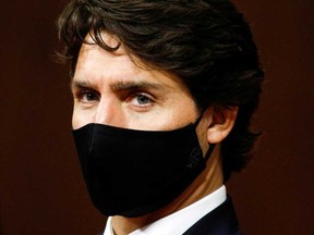 Canada's Prime Minister Justin Trudeau listens to Governor General Julie Payette deliver the Throne Speech in the Senate on Wednesday.