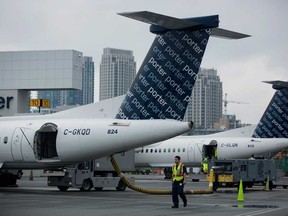 Porter Airlines Inc. aircraft sit parked at Billy Bishop Toronto City Airport in Toronto.