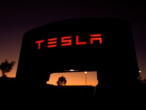 A Tesla supercharger is shown at a charging station in Santa Clarita, California, in 2019.
