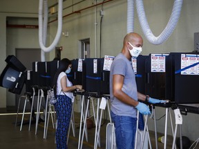Voting booths in Miami, Florida, in August.