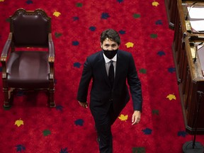 Prime Minister Justin Trudeau heads back to his seat before the delivery of the Speech from the Throne on Wednesday.