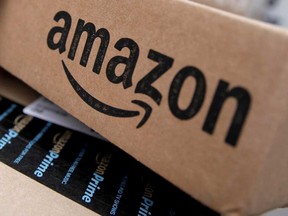 Amazon.com Inc's third-quarter revenue beat Wall Street estimates.